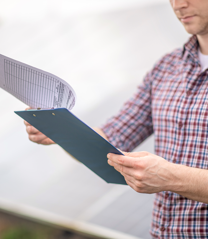 documentation attention hands man plaid shirt holding blue folder with documents standing fresh air near special object 1